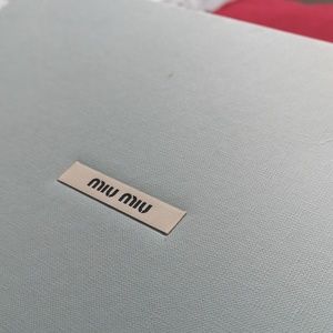 MIU MIU SILVER GLITTER PLATFORM SANDALS.